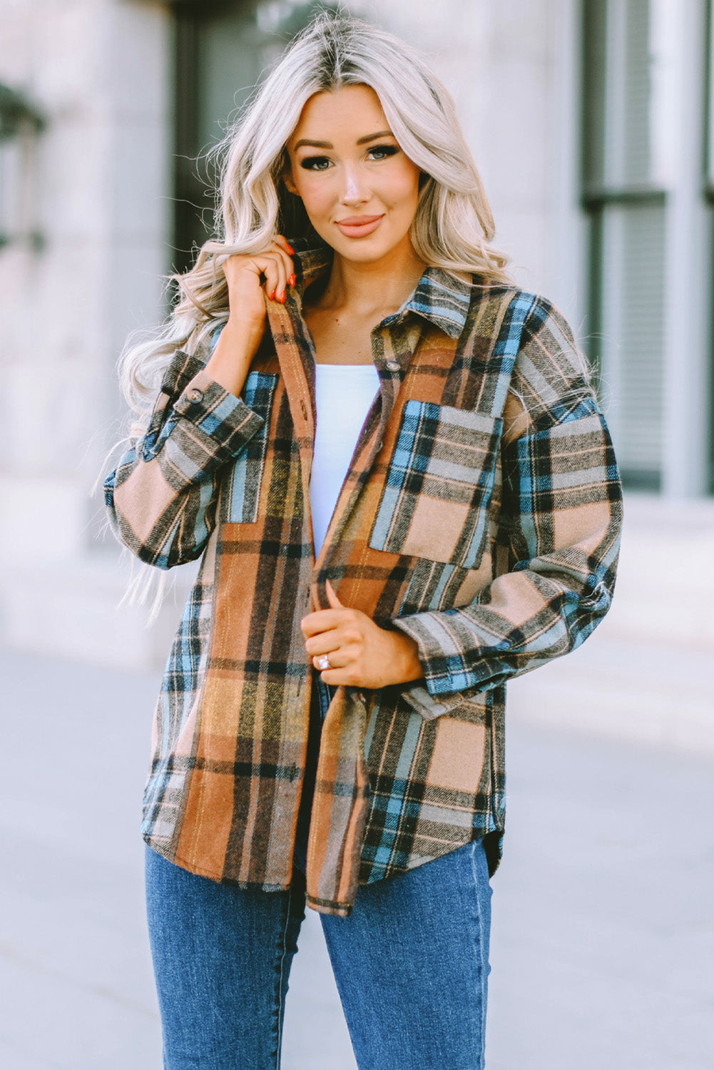 Woman's Plaid Curved Hem Shirt Jacket with Breast Pockets in Blue/Rust