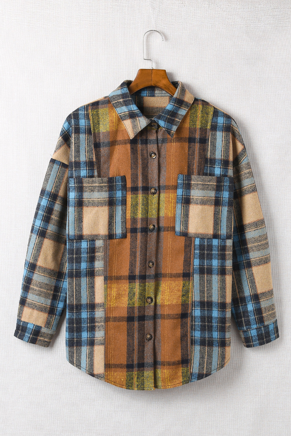 Woman's Plaid Curved Hem Shirt Jacket with Breast Pockets in Blue/Rust